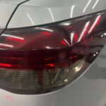 Aplicação de Máscara Negra em Faróis Automotivos